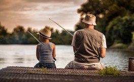 man and boy fishing
