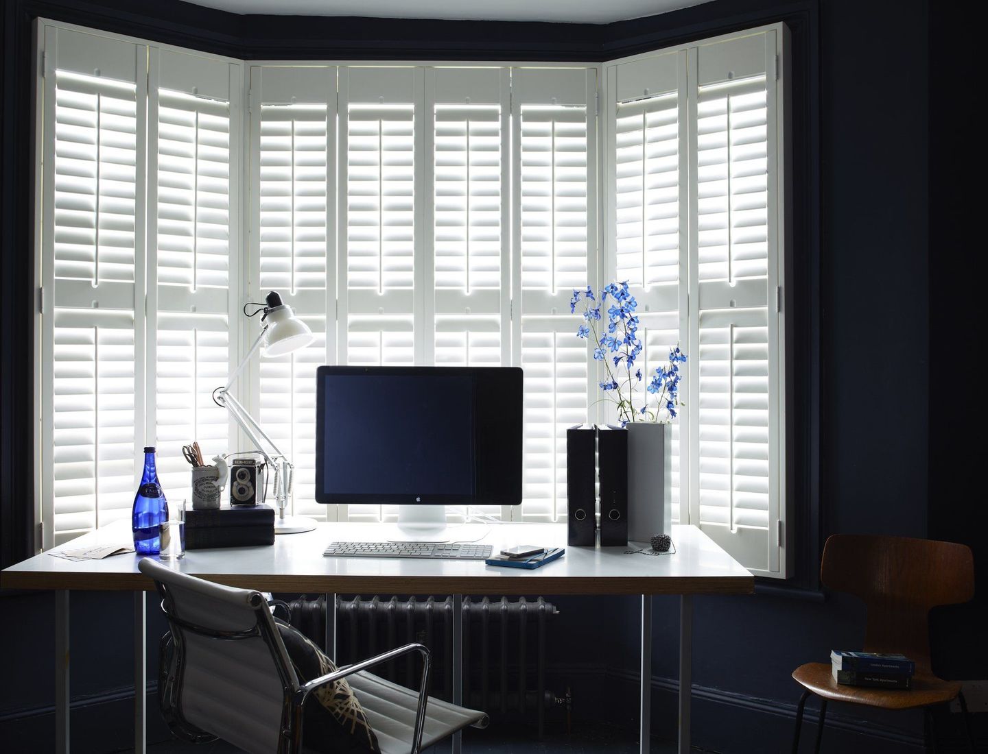 White shutters with central tilt rods office
