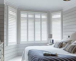 White shutters in the bedroom