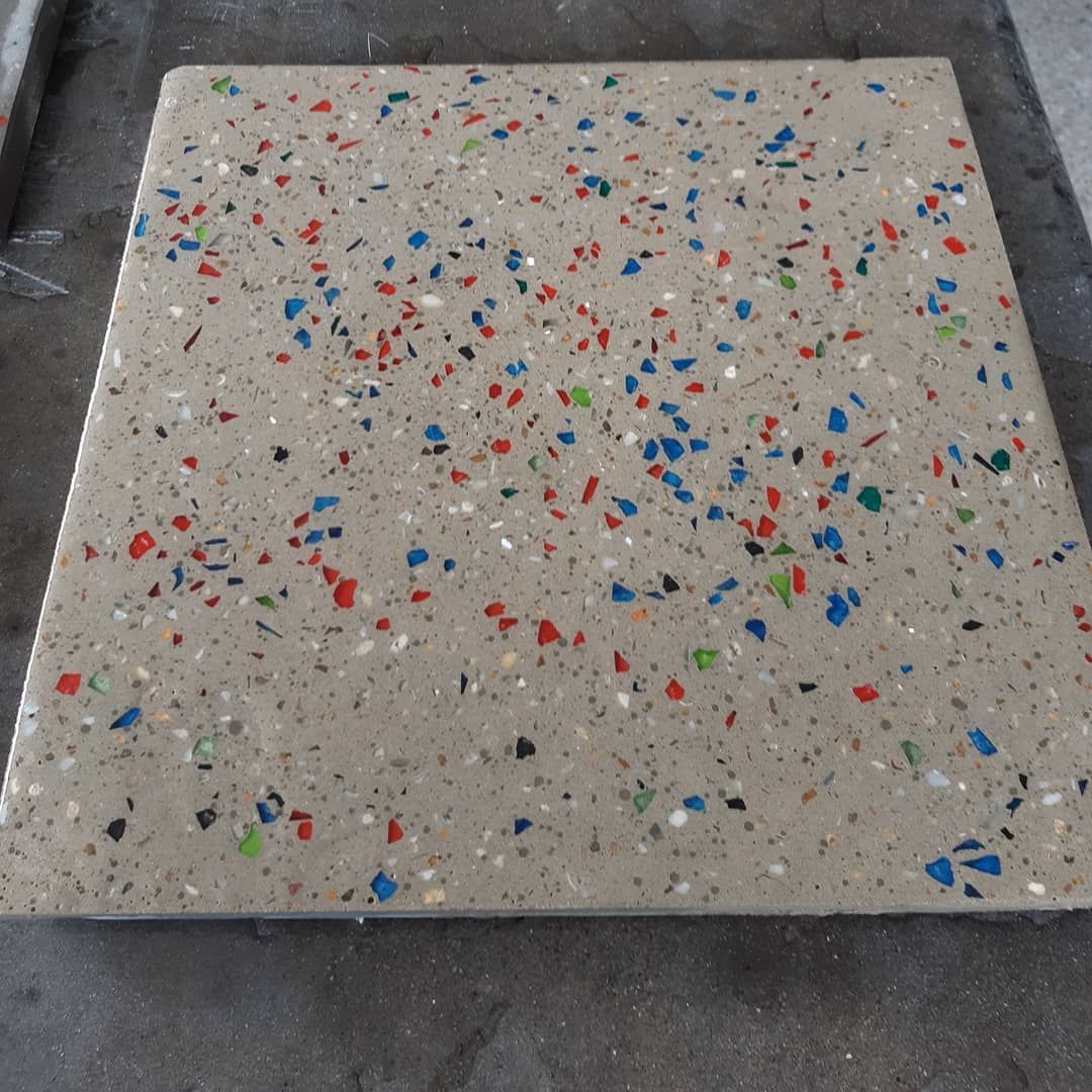 A Square Concrete Paver Featuring a Beige Base — JDB Concreting in Horsley, NSW
