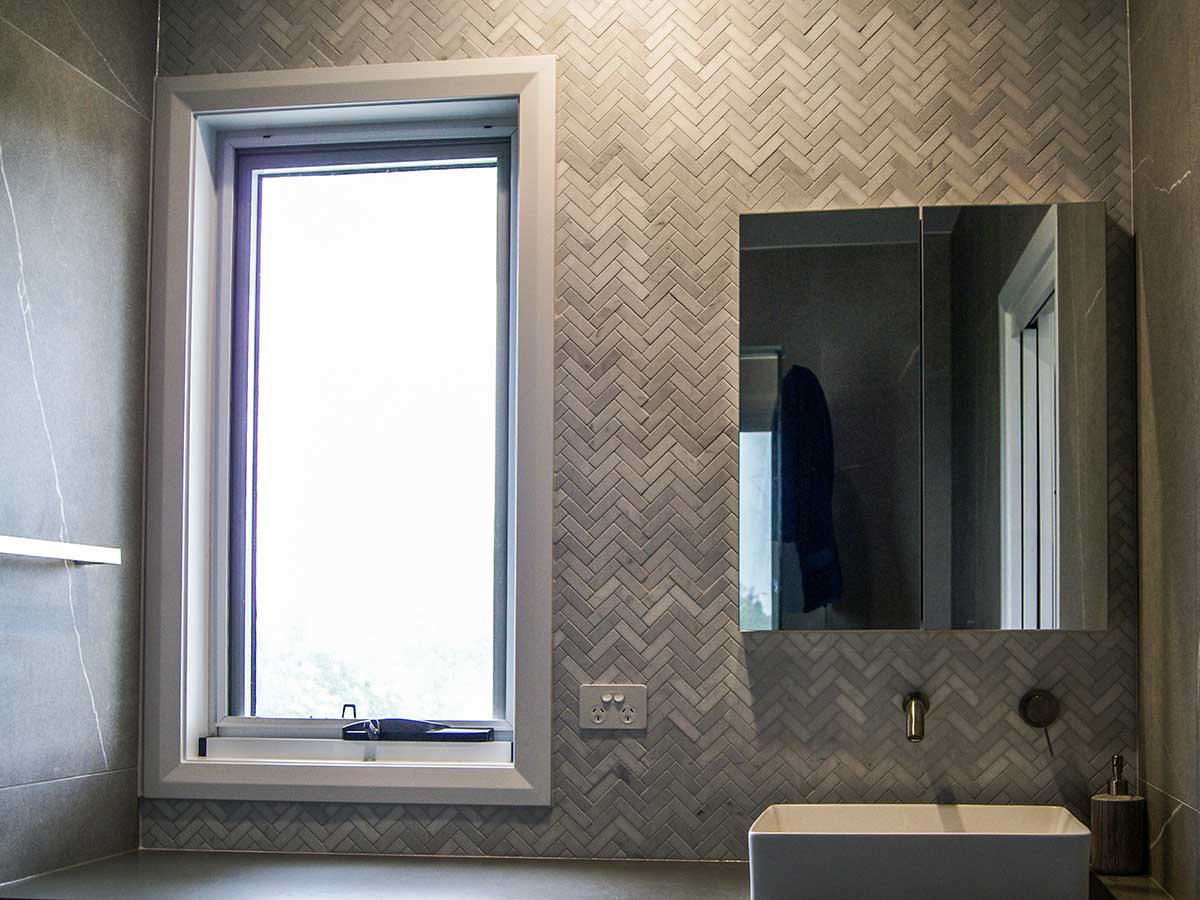 Cross hatching tiles laid in a Hamptons inspired home in the Gold Coast Hinterland