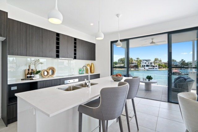 Great design means easy living. This light filled kitchen make the most of the canal views
