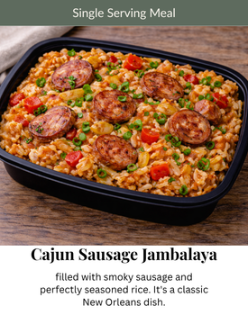 A black plastic container filled with Cajun sausage jambalaya on a wooden surface, labeled 