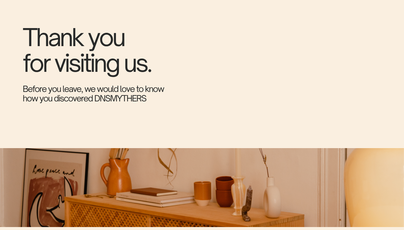 Thank you message over a photo of a wooden shelf with home decor items.