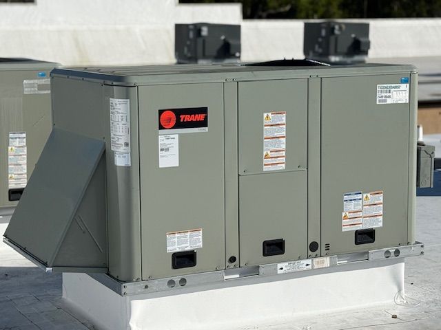 A wooden deck with stairs leading to the water