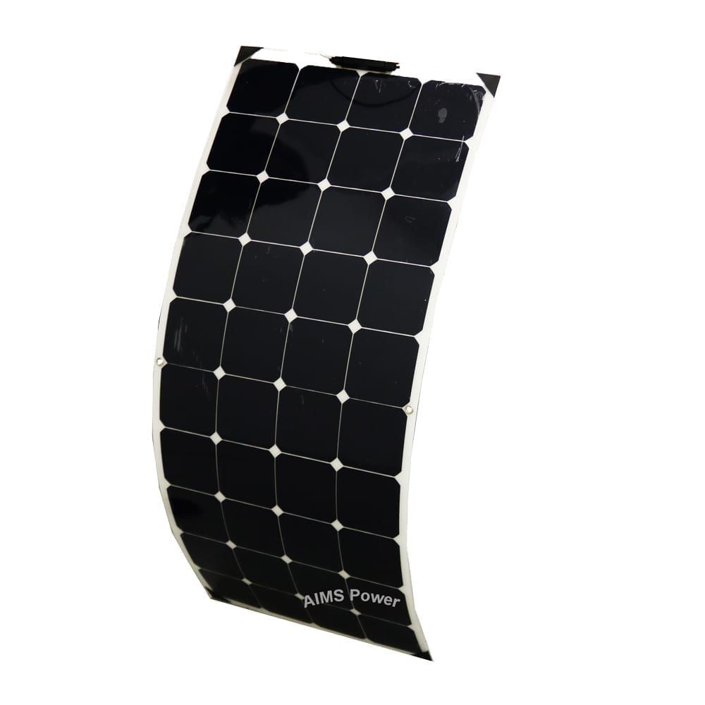 A flexible solar panel is sitting on a white surface.