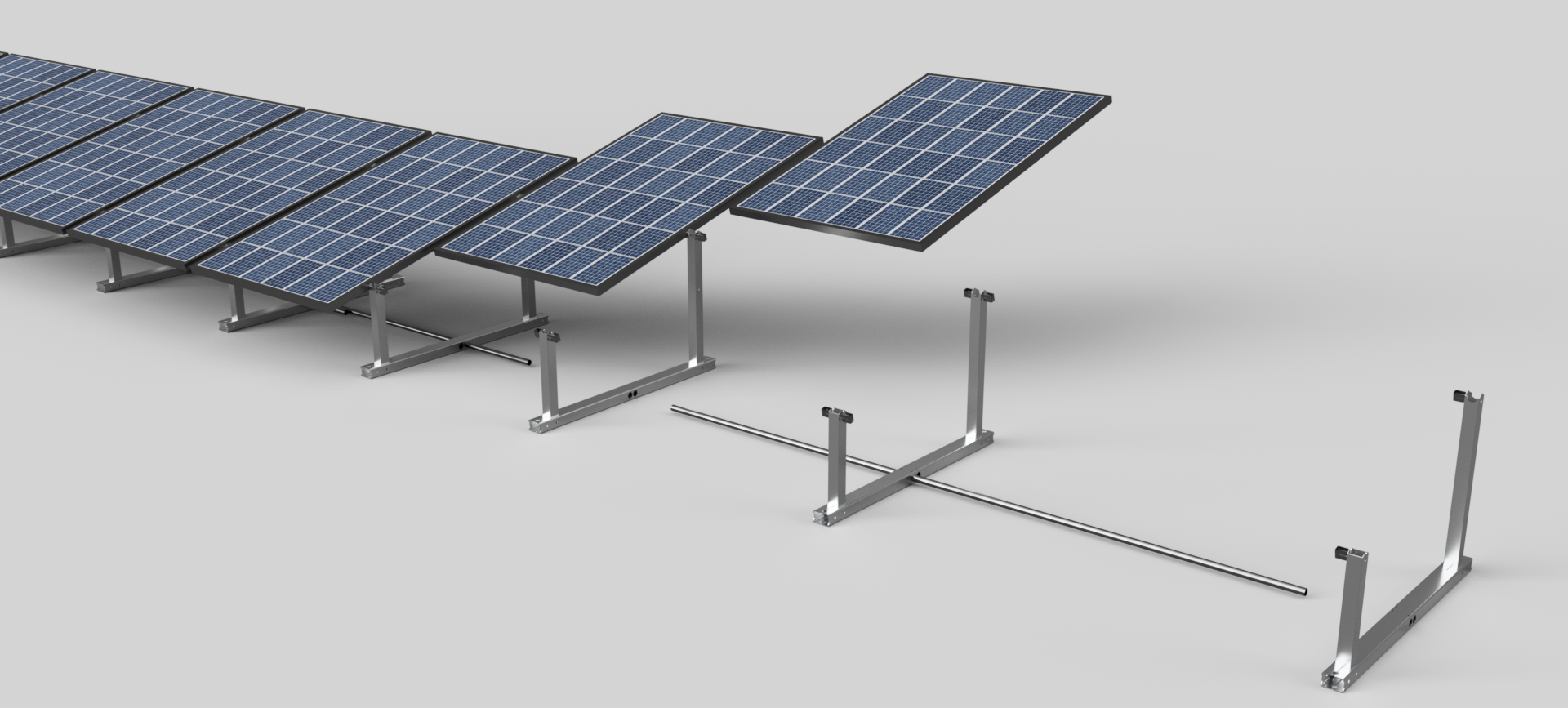 A row of solar panels sitting on top of each other on a white surface.