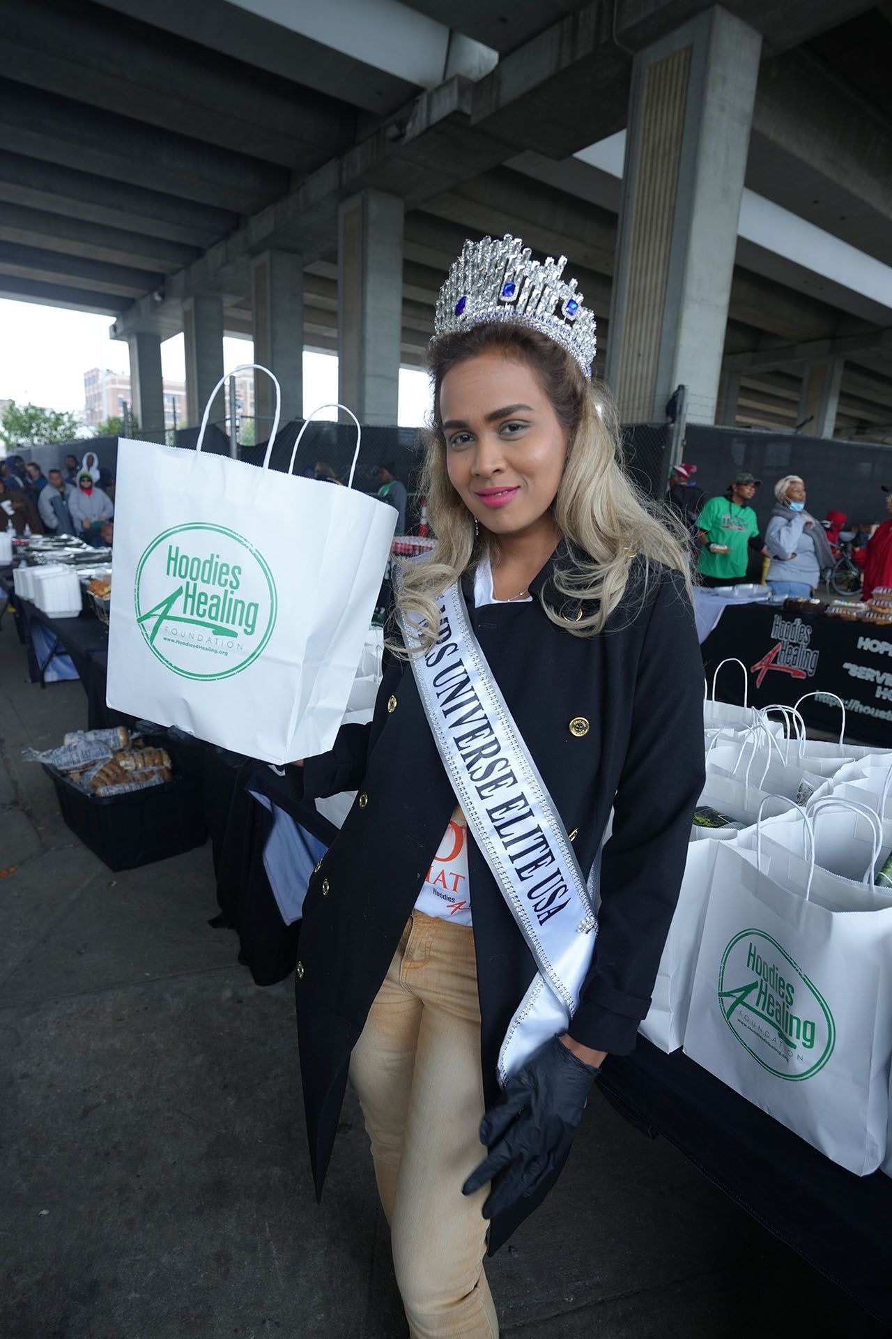 A woman wearing a sash that says ' new york state health ' on it
