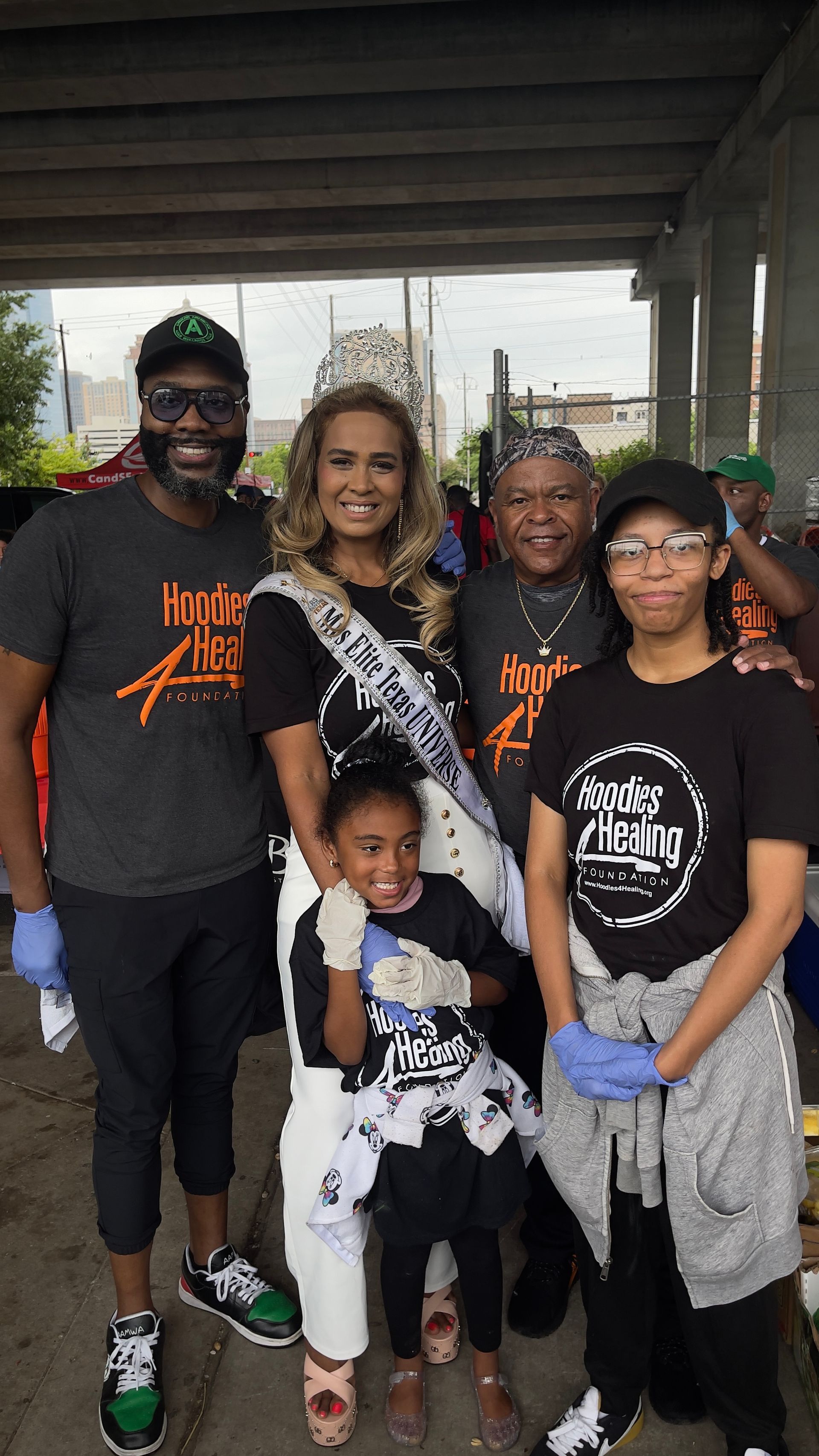A group of people are posing for a picture together.