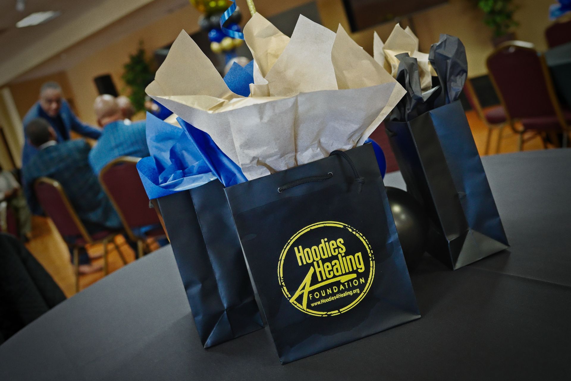 A black bag with the word hoodies on it