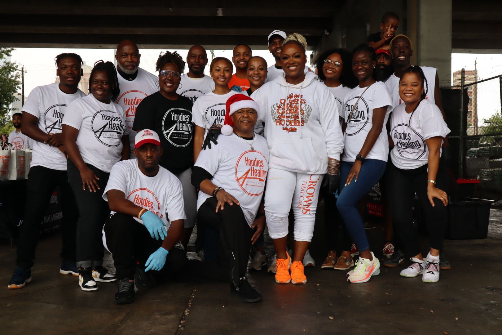 A group of people are posing for a picture together.