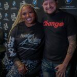 A man and a woman are posing for a picture together.