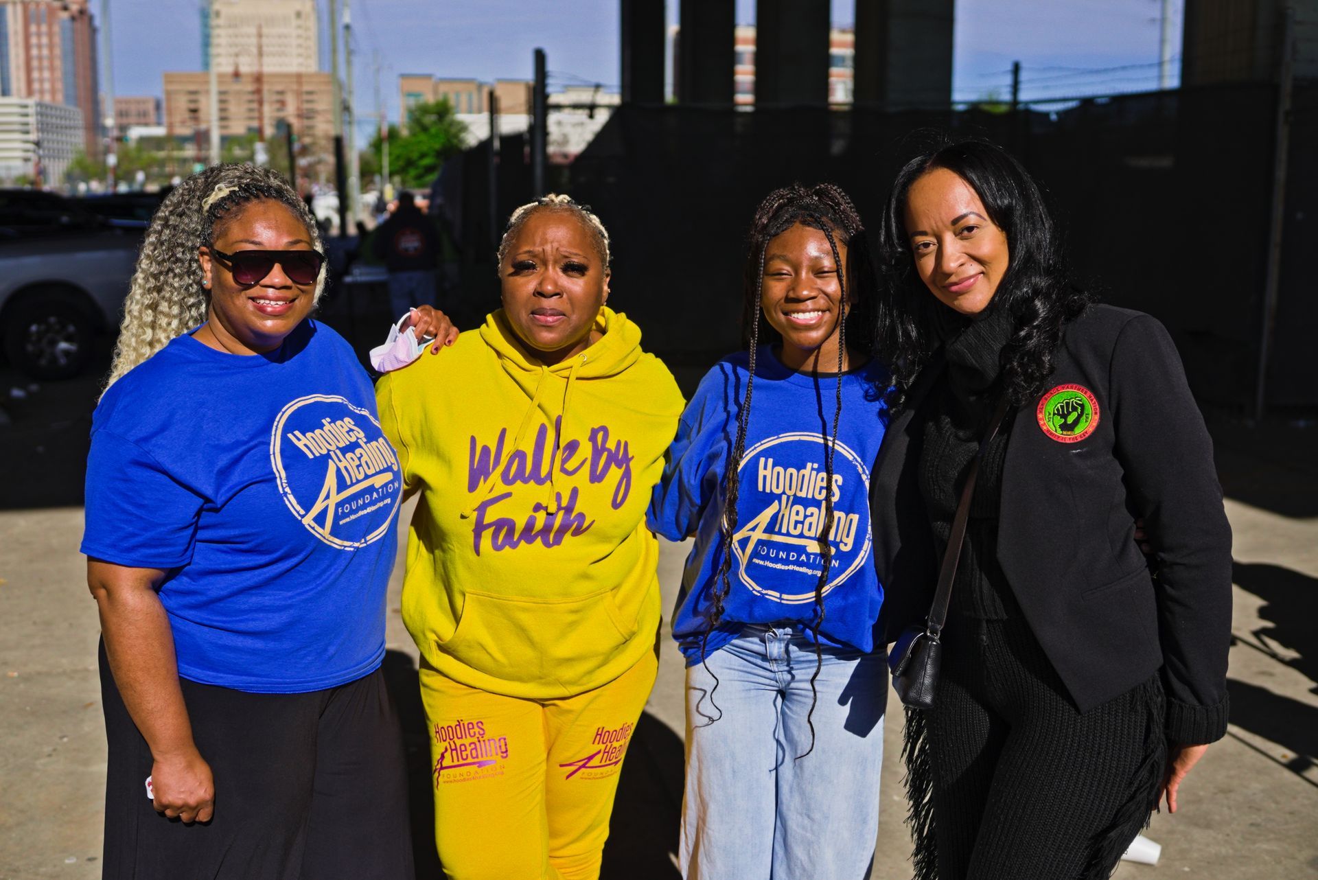 A group of women are posing for a picture together.