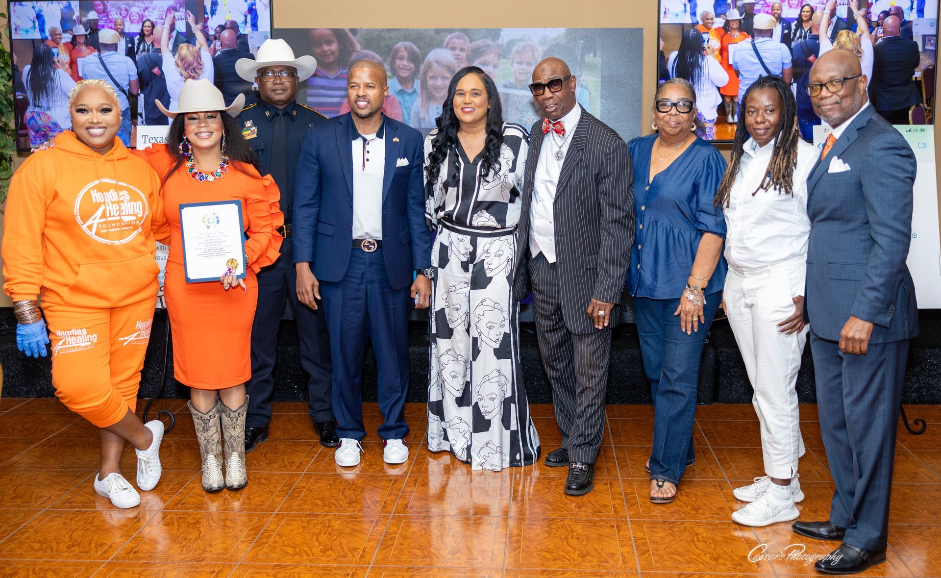 A group of people are posing for a picture together.