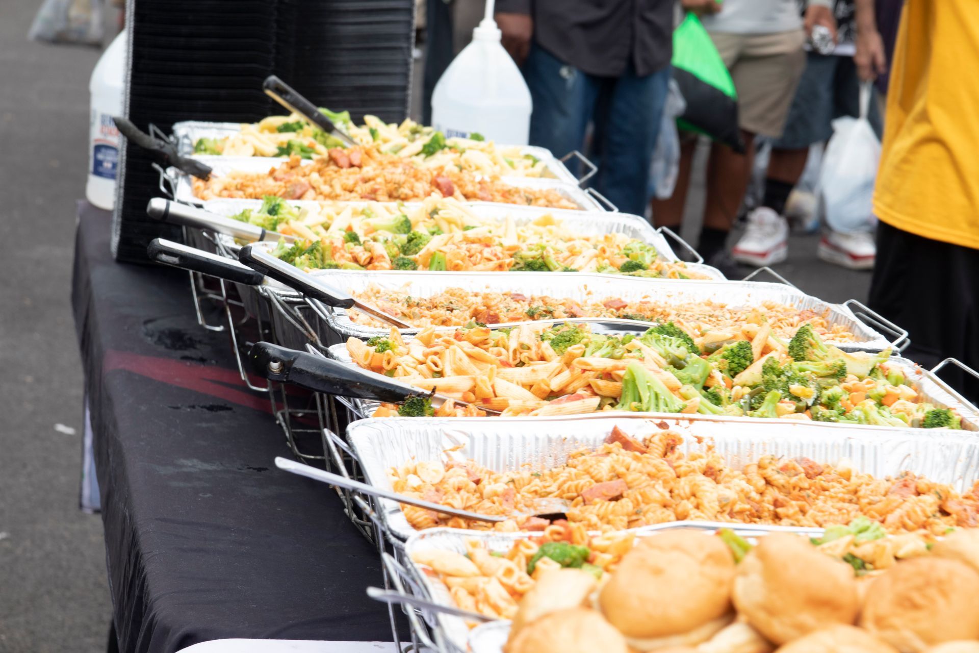 A buffet table with a lot of food on it