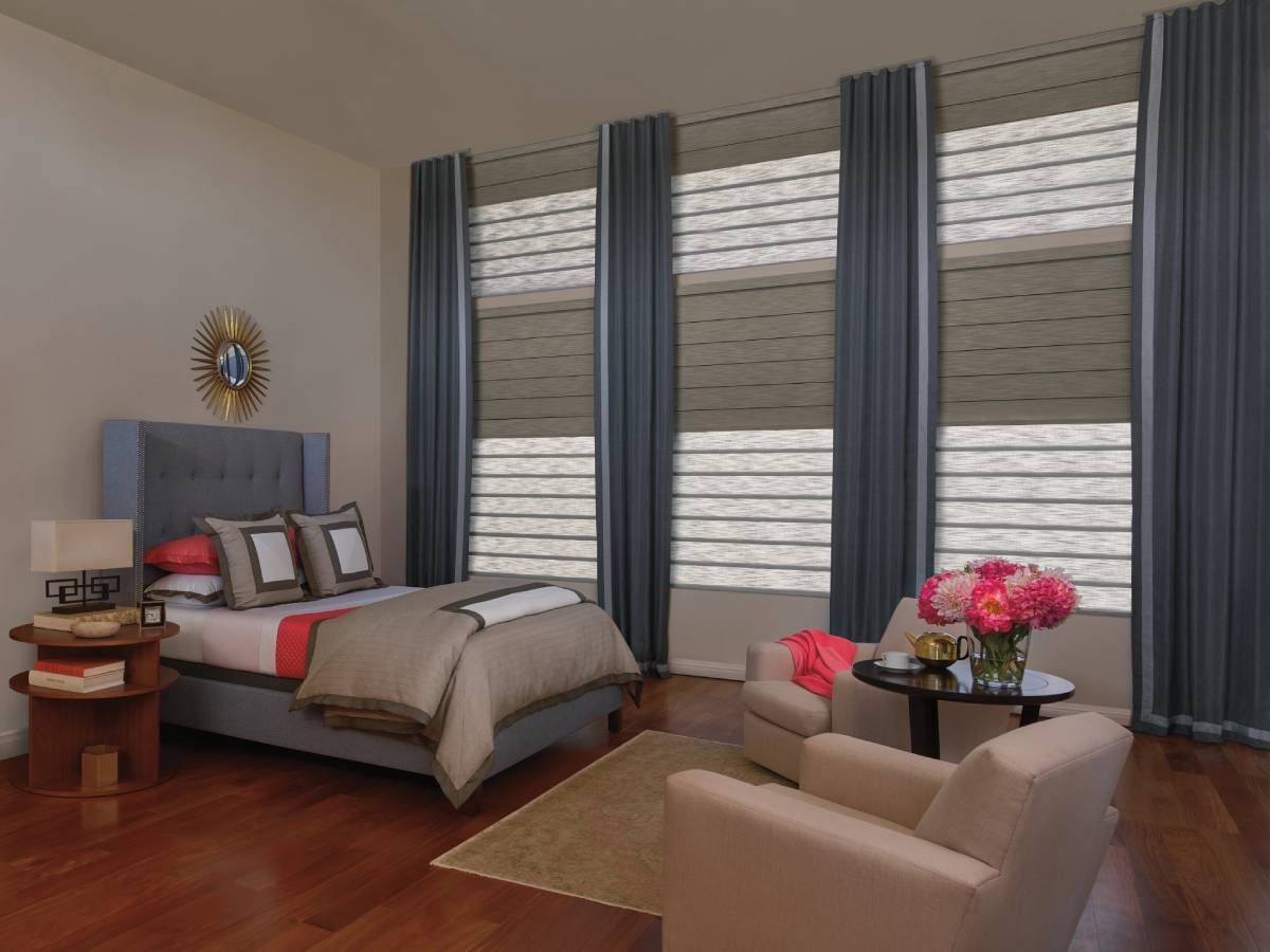 Hunter Douglas Vignette® Roman Shades with accent drapery near La Quinta, CA.