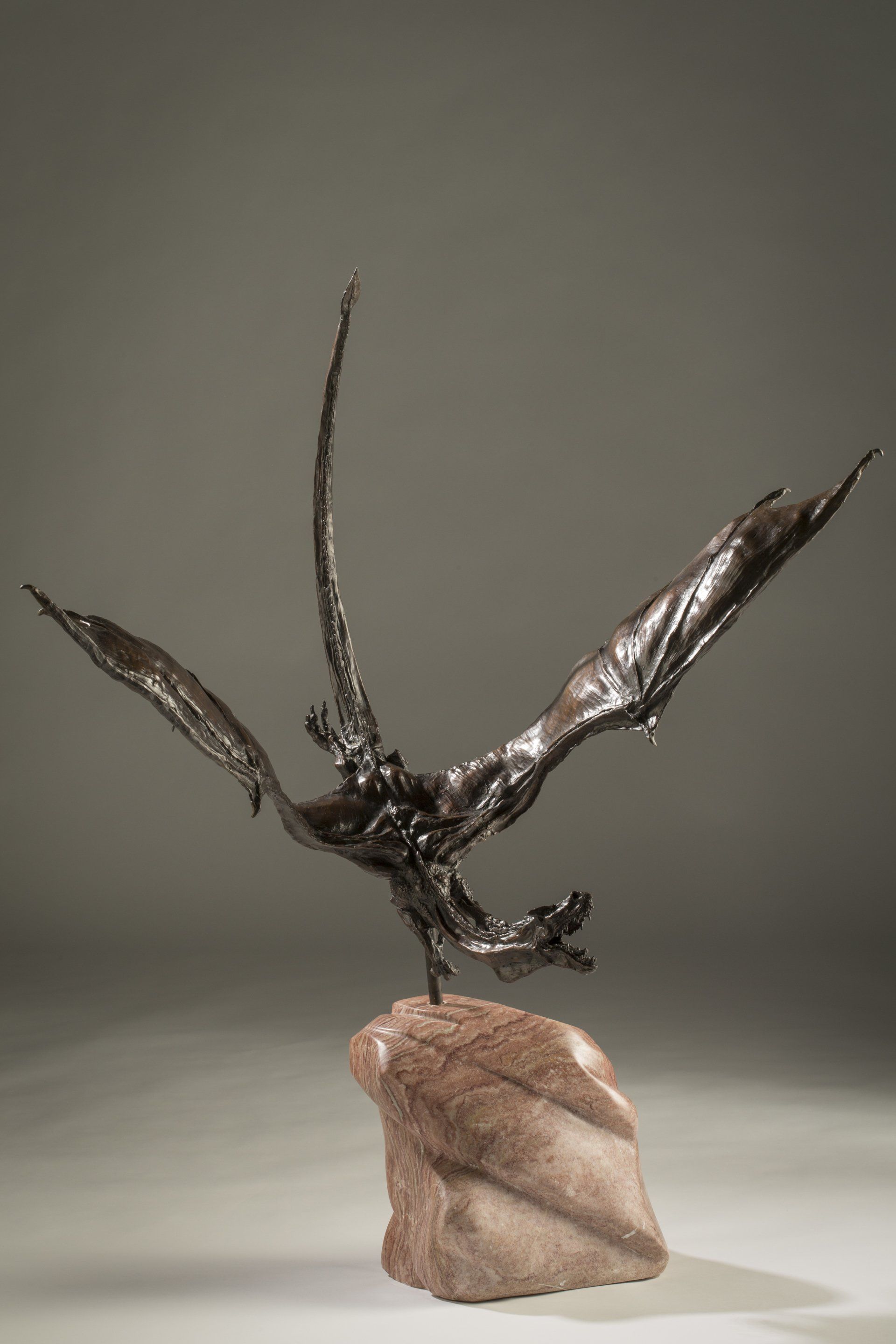 flying dragon sculpture in bronze