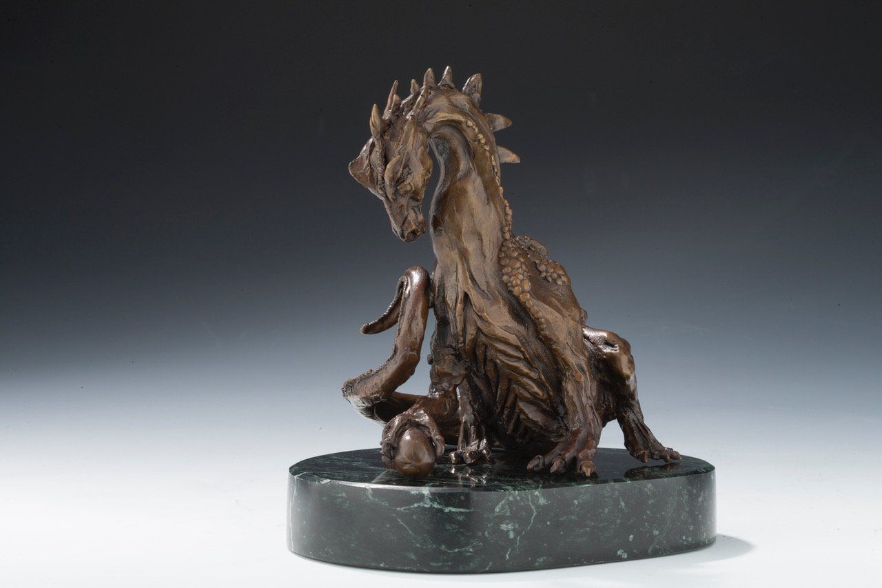 Mother Dragon with Egg sculpture in bronze on green marble base