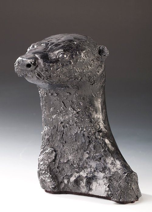 bust study of otter in bronze