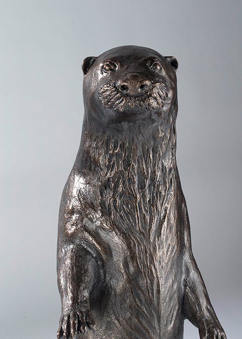 standing otter sculpture