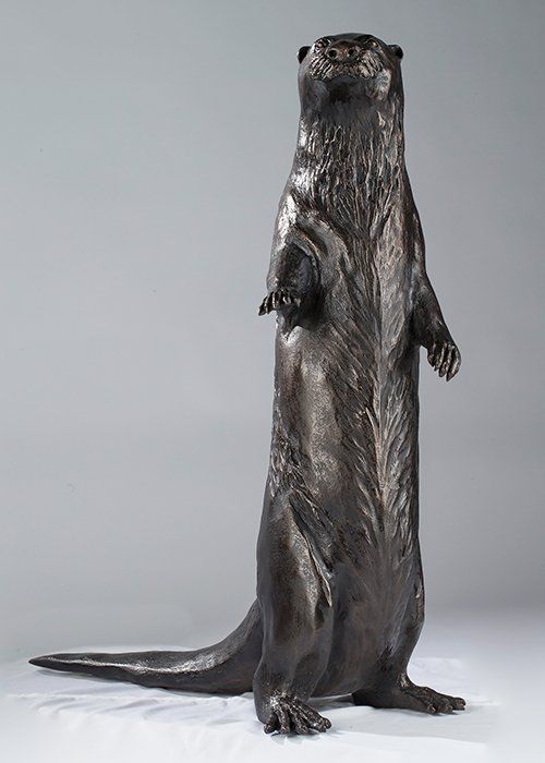 standing otter bronze sculpture