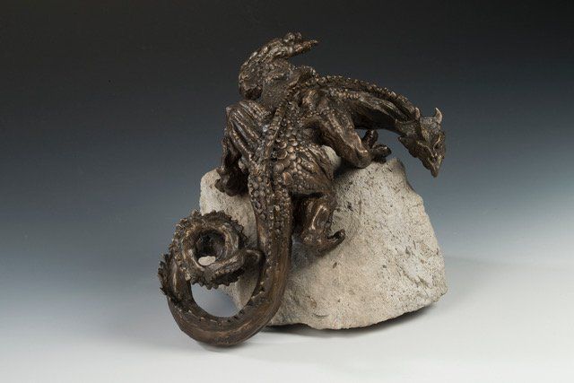 sentinel dragon sculpture in bronze on stone base