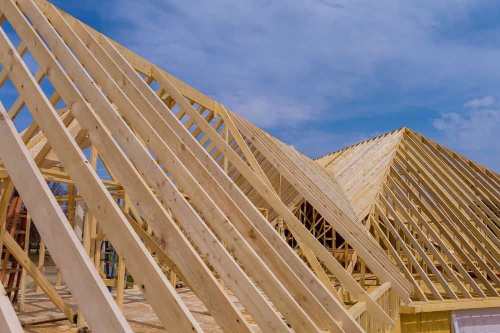Wooden Roof Trusses to a Exterior View of Timber Frame House — Roof Trusses in Caloundra, QLD