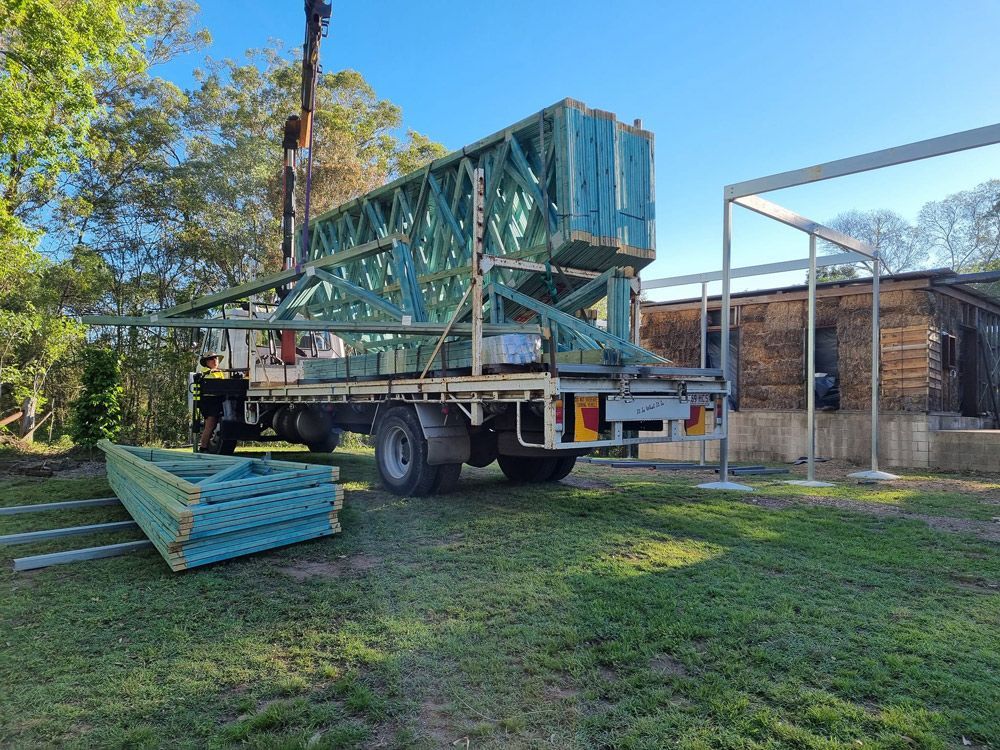 Unloading Timber Trusses On A Vehicle