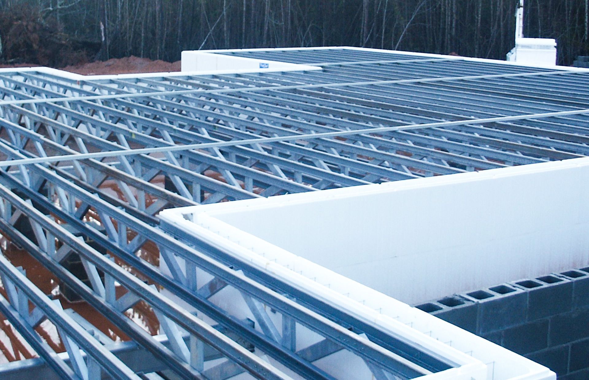 a metal structure is being built on top of a building