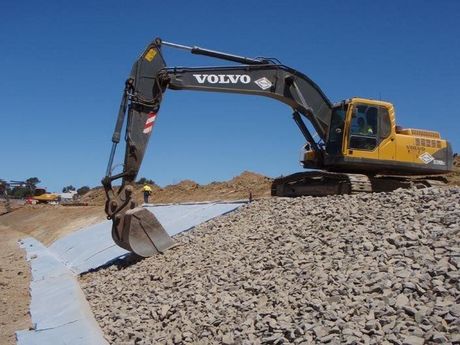 Excavator Working on a Pile of Rocks — Victor Harbor, SA — South Coast Sand & Civil