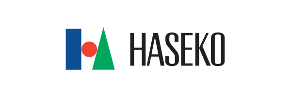 A haseko logo with a blue , green and red triangle on a white background.