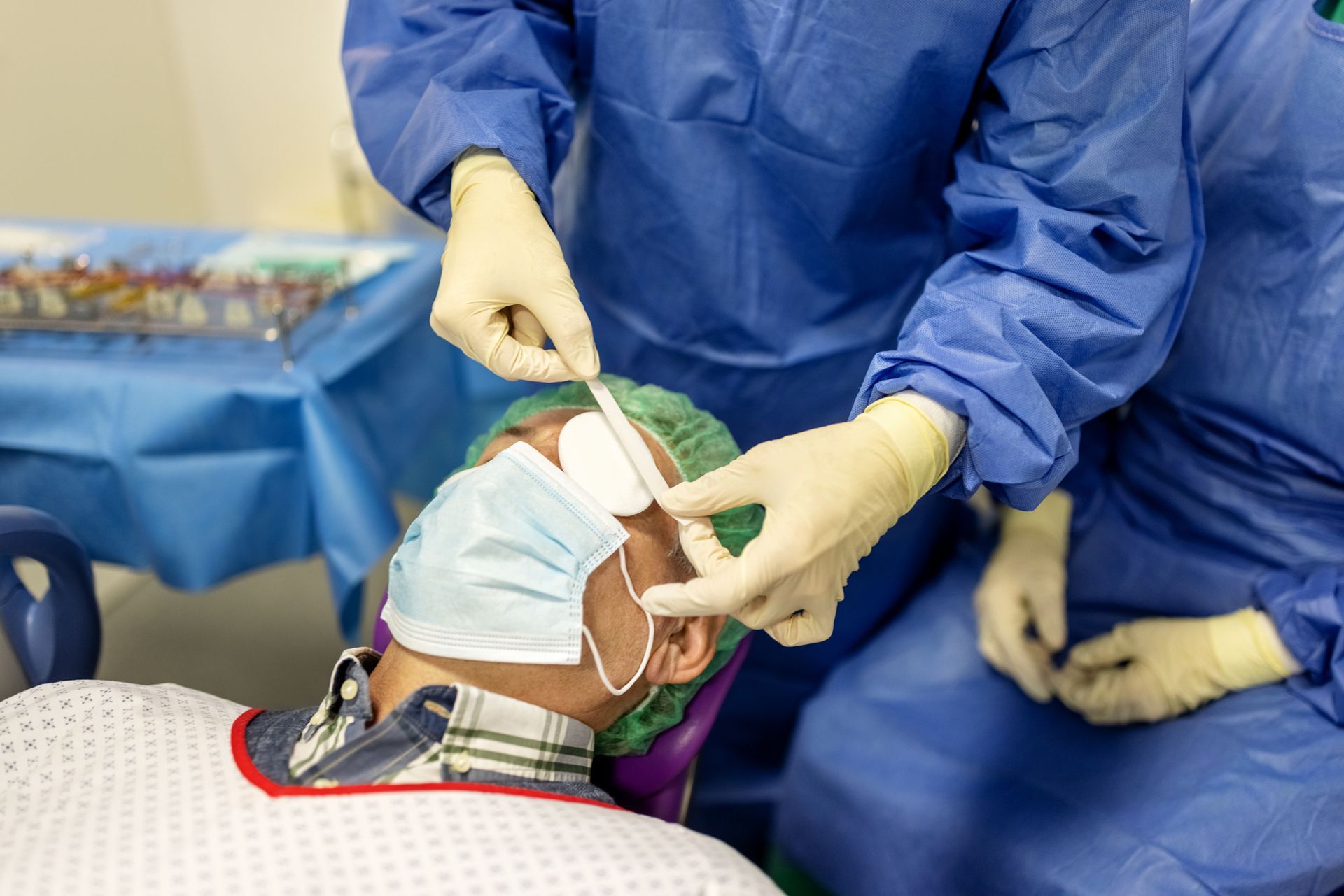 A patient after getting an eye surgery at the hospital.