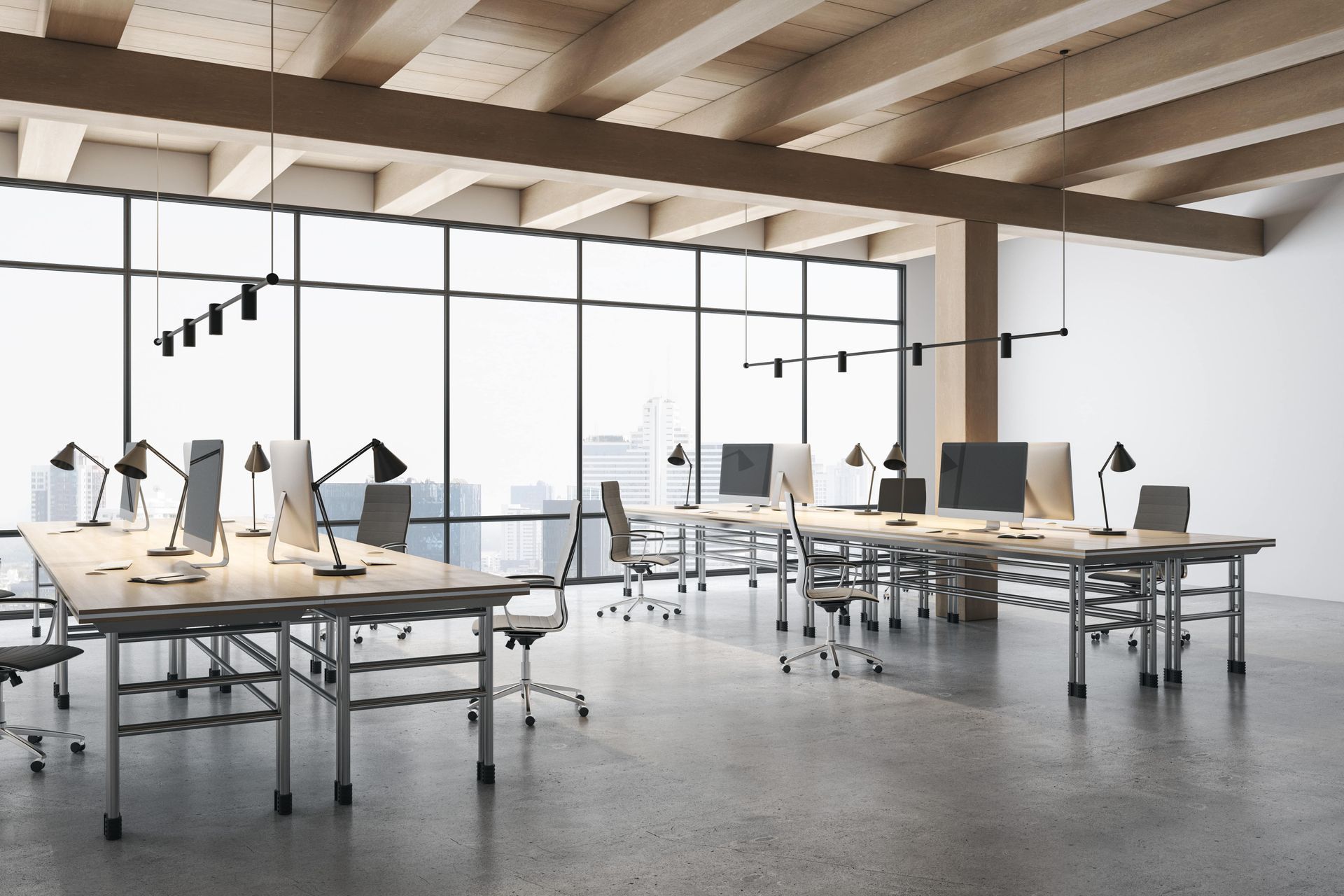 An empty office with a lot of desks and chairs