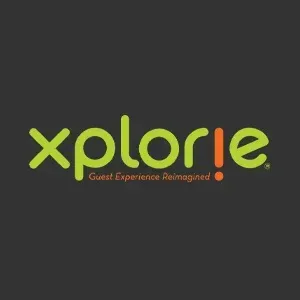 Logo for Xplorie featuring lime green text on a dark gray background with an orange exclamation point as the letter 'i'.