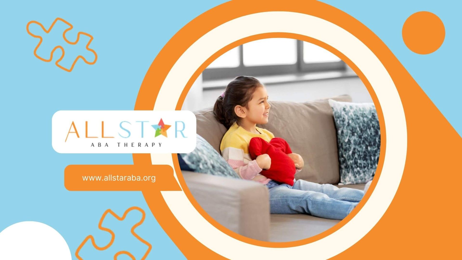 Girl with autism holding heart pillow during ABA therapy.