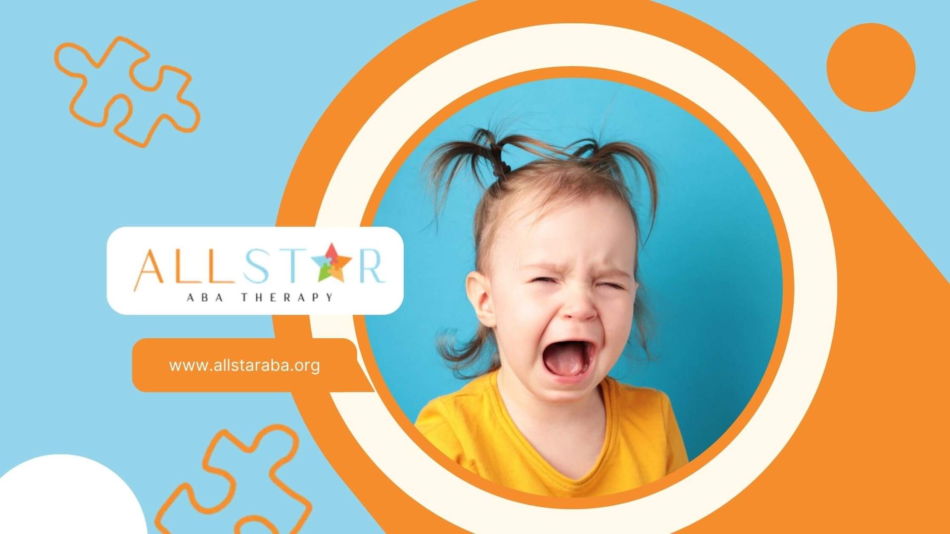 Young child crying with mouth open wide against a blue background in ABA therapy.