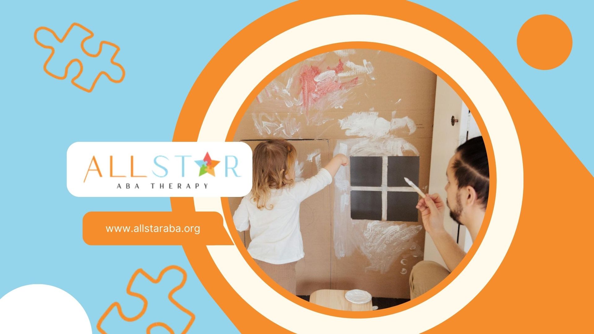 An autistic toddler painting cardboard house with an ABA therapist during ABA therapy in Maryland.