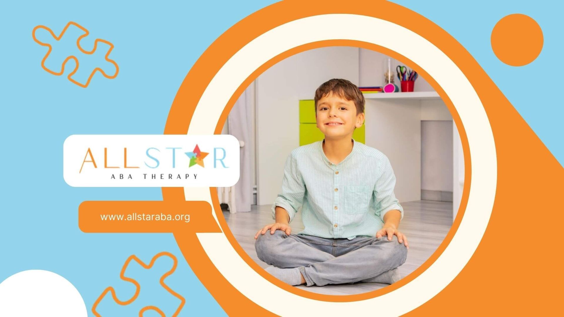 Young boy with autism sitting cross-legged on the floor in a bright playroom during ABA therapy.