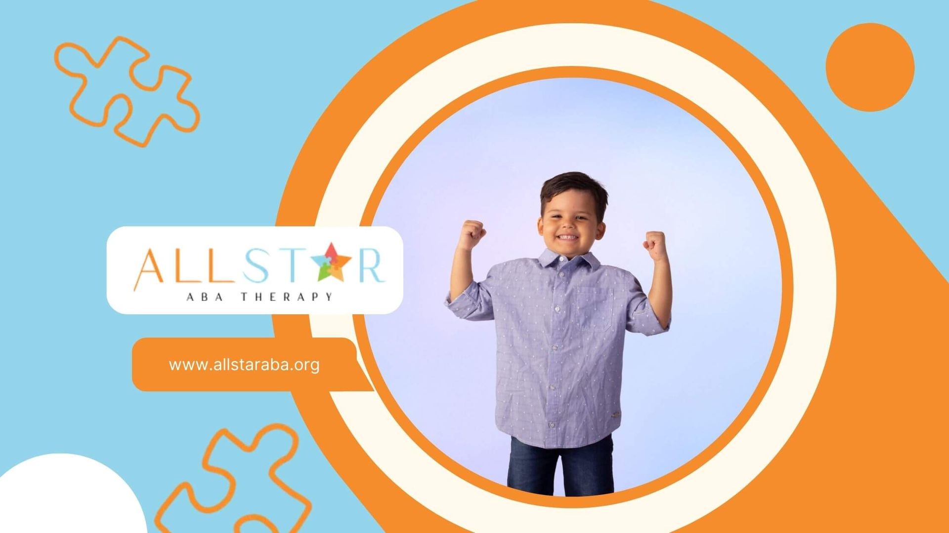 A smiling boy with autism flexes his muscles proudly in front of a soft-colored background.