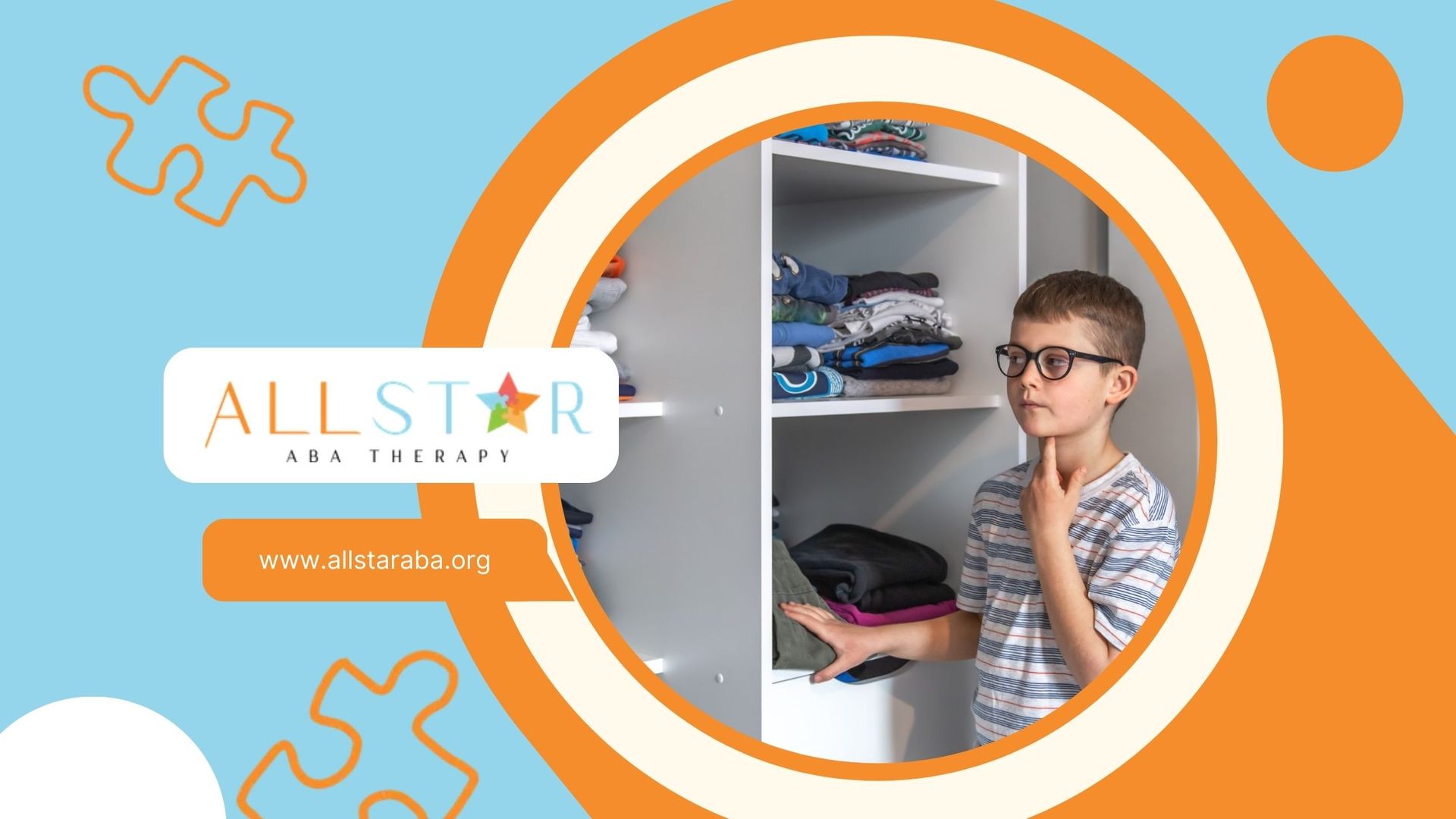 A young boy wearing glasses is standing in front of a closet filled with clothes.