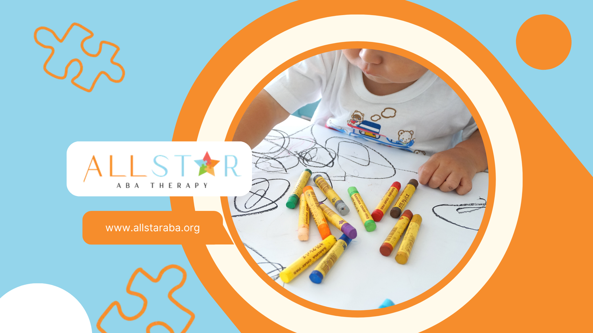 A child is sitting at a table with a bunch of crayons on it