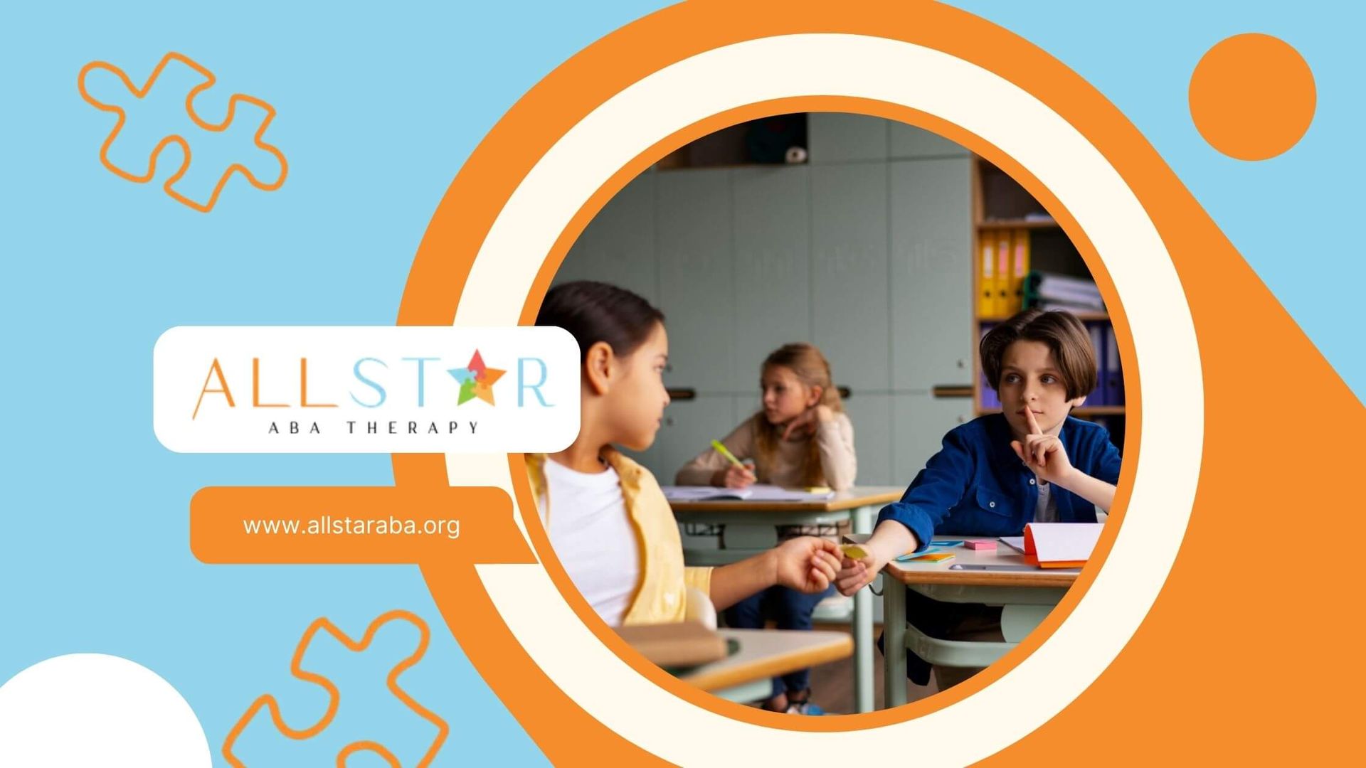 A child sits at a desk, handing a sticky note to a classmate.