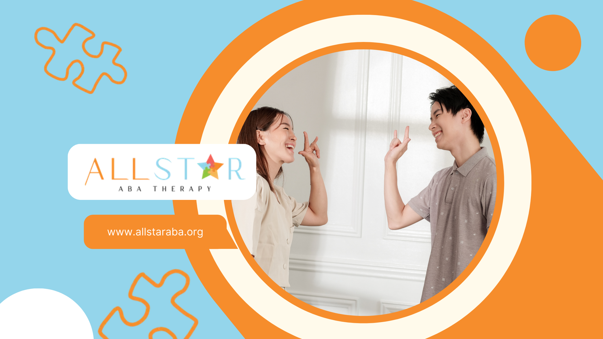 Two people smiling and pointing at each other