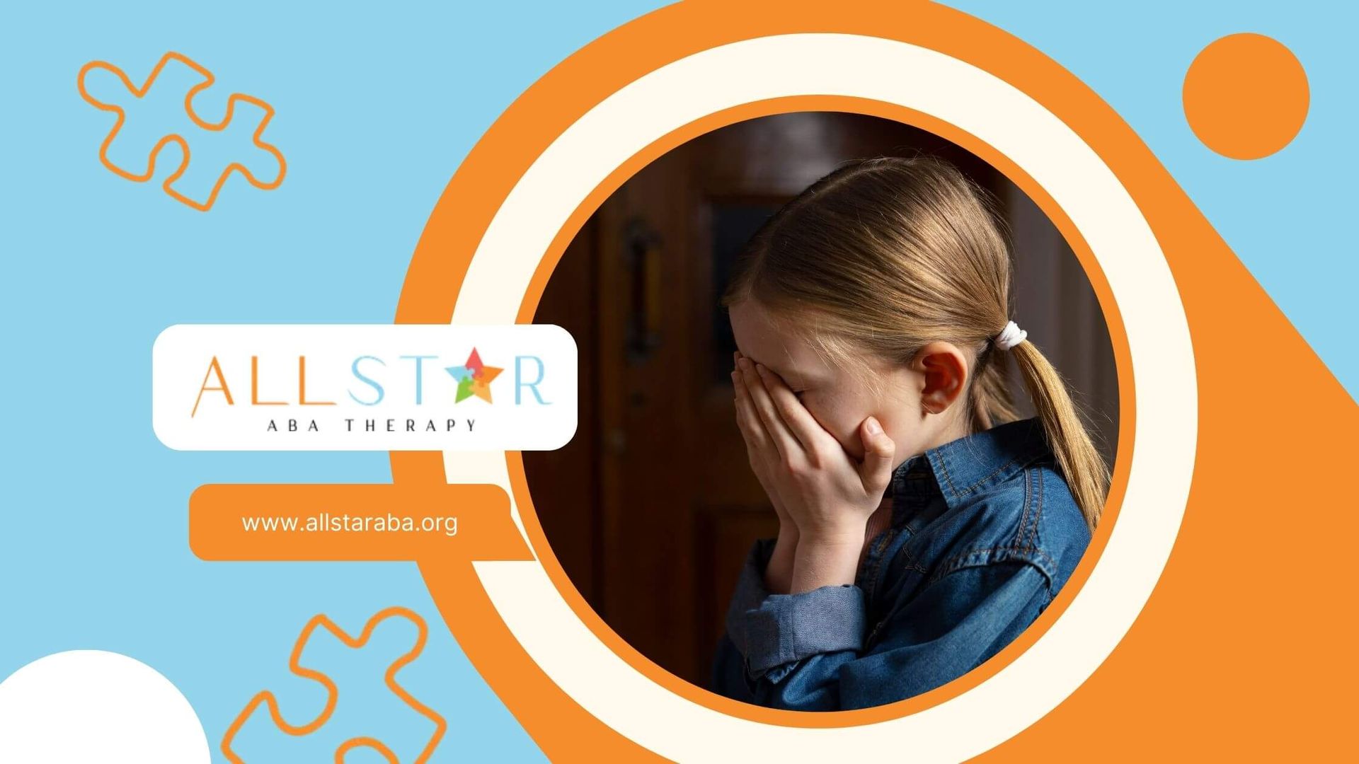 A young autistic girl sitting in a room covering her face with her hands, expressing sadness.
