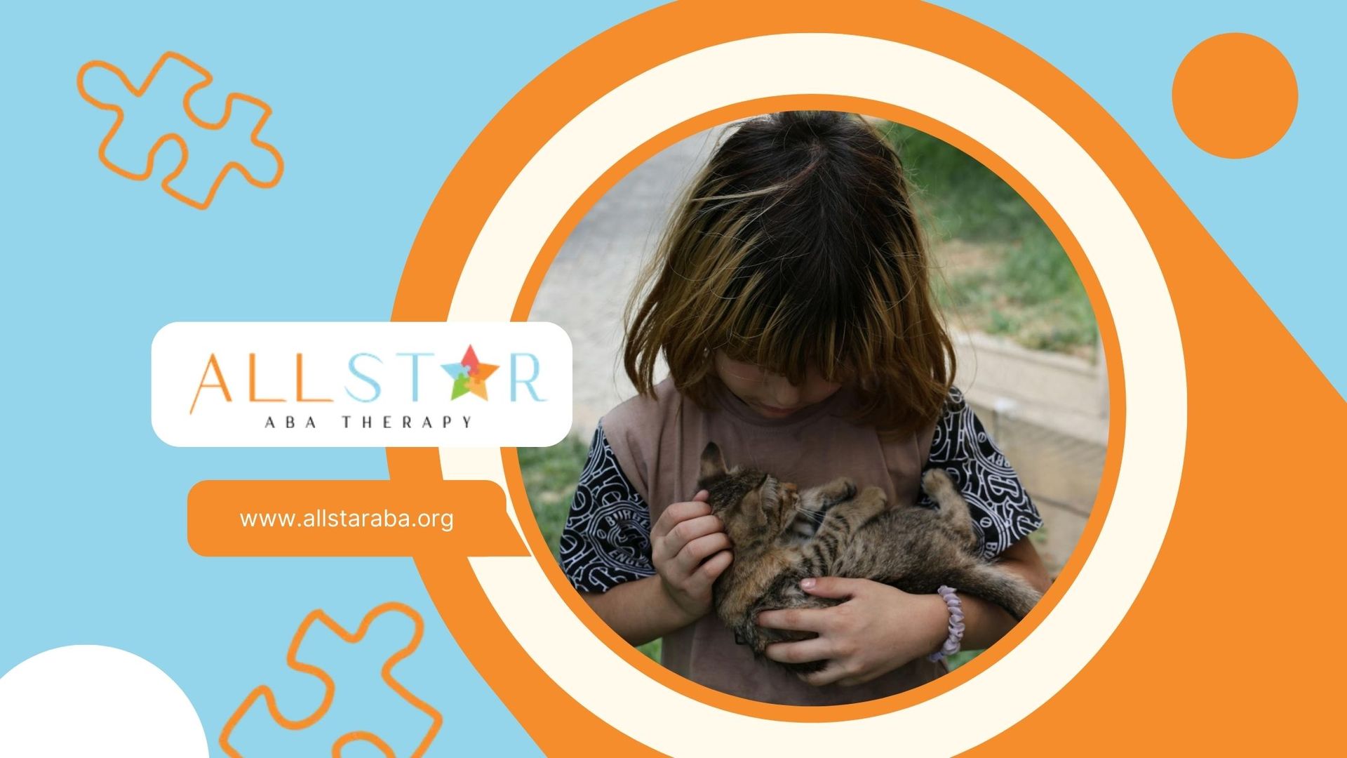 An autistic girl holding and petting a kitten in her arms during ABA therapy session in Maryland.