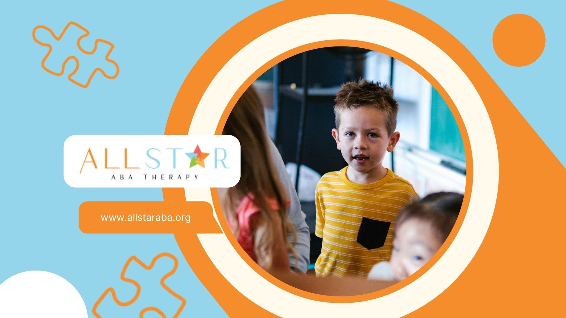 An autistic boy in a classroom looking at the camera during an ABA therapy session at school in MD.