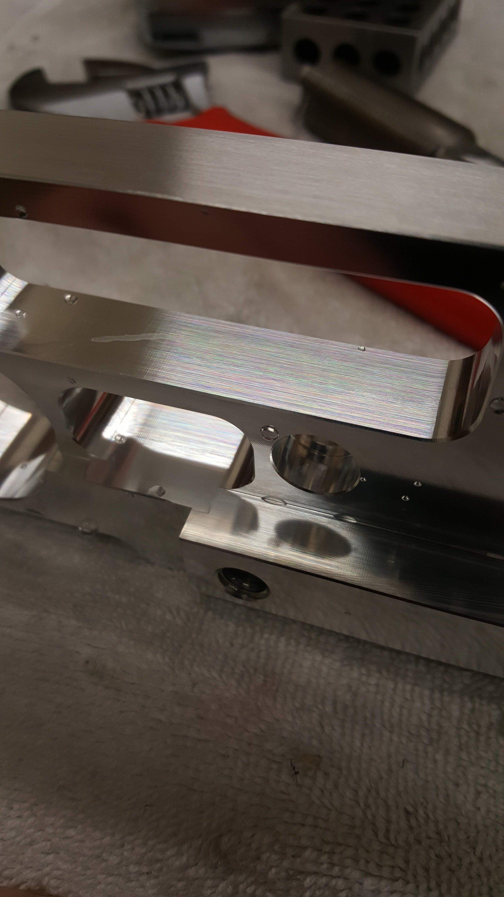 A close up of a piece of metal on a table.