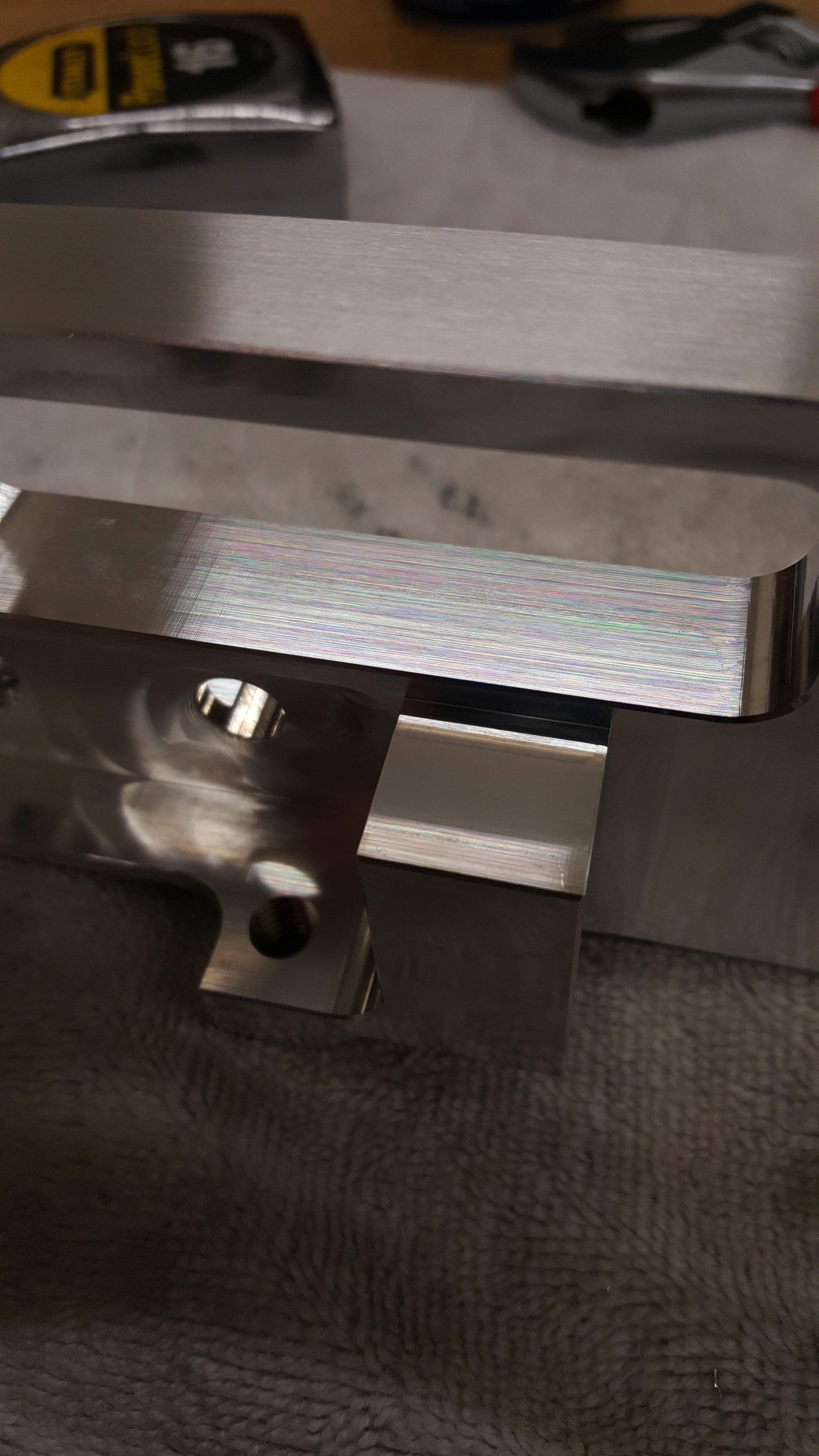 A close up of a piece of metal on a table.