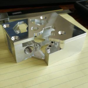 A piece of metal is sitting on a piece of paper