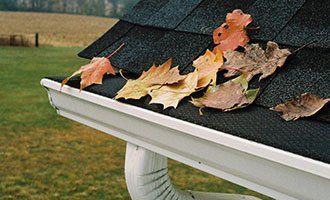 Gutter Installation — Leaves on the Roof in Clifton, NJ